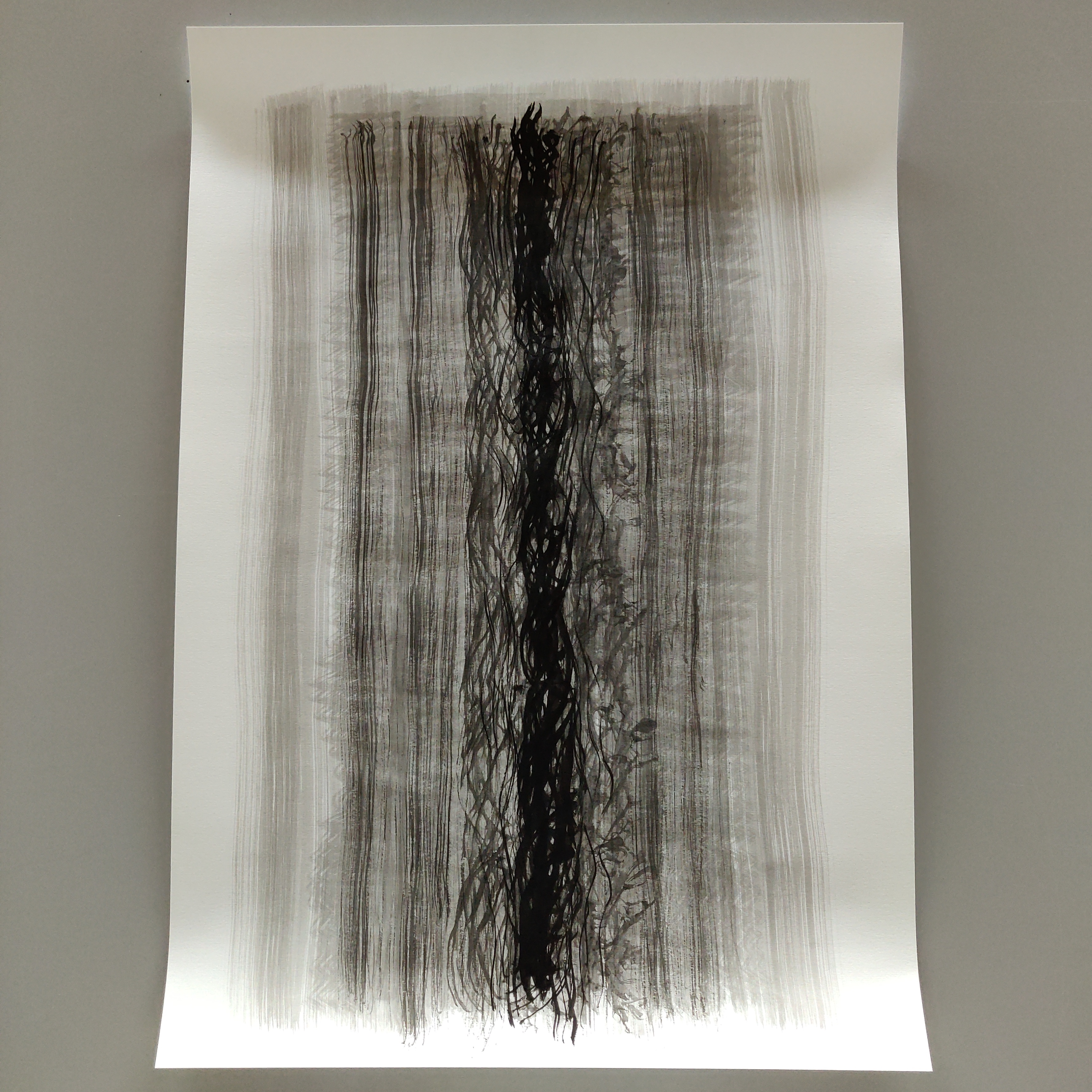 photograph of an abstract drawing, black ink on paper, same as the scan in the first image